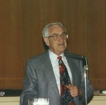 Mendel Piser at podium