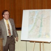 Alan Dowty next to map of Israel