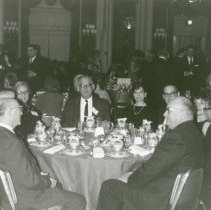 People sitting at elegant table