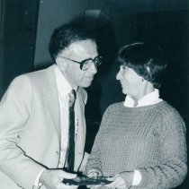 Harold Slutsky presenting Ina Rosenberg with an award