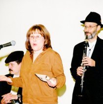 Woman announcing musicians