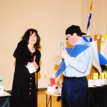 Two people in front of group at Federation