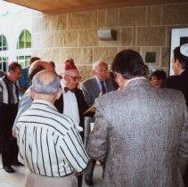 People gathering outsie Federation building for dedication