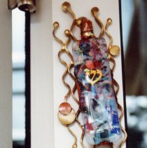 Closeup of mezuzah that was placed on Federation building at dedication