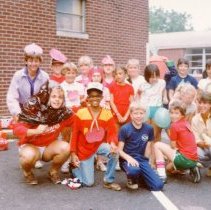 Campers and counselors posing dressed in costumes for Veggie Day