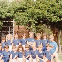 Counselors and campers posing for photo ourodors at Sinai synagogue