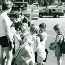 Campers listening to their counselor outside Temple Beth-El