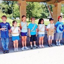 Campers standing in line outside Federation building