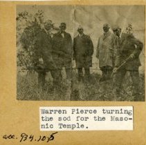 Warren Pierce turning the sod for the Masonic Temple