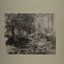 Menotomy Rocks Park, with woman by gate