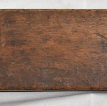 Detail - "JN" and scratches