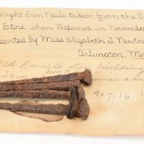 4 Nails with cards describing them