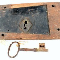 Front of lock, with key next to it