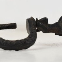 Detail - Top, figure facing front