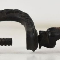 Detail - Top, figure facing back