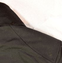 Condition: Hole on back right shoulder