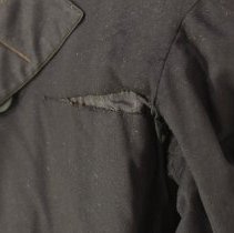 Condition: Mend by left armscye