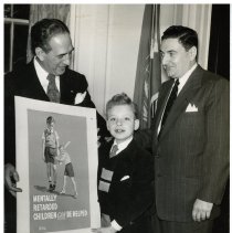 Mayor Vincent McPhelletter with child from New York City
