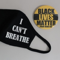 Mask and Pin collected by Alexandria Black History Museum staff