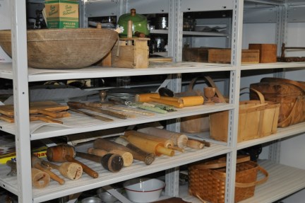 Photograph of wooden household objects in collections storage