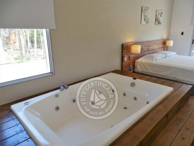 Dormitorio cama doble planta alta CASA