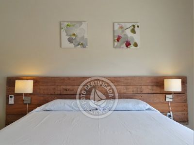 Dormitorio cama doble planta alta CASA