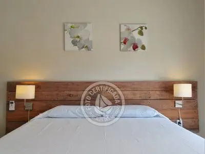 Dormitorio cama doble planta alta CASA