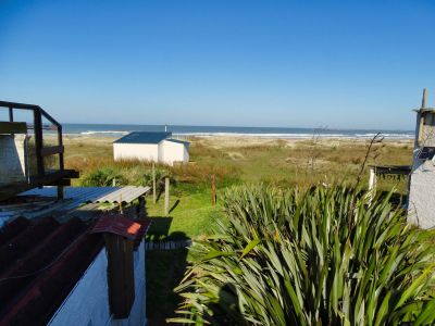 Habitación Corvinas: Triple superior vista faro y dunas - Carmela Cabo Polonio