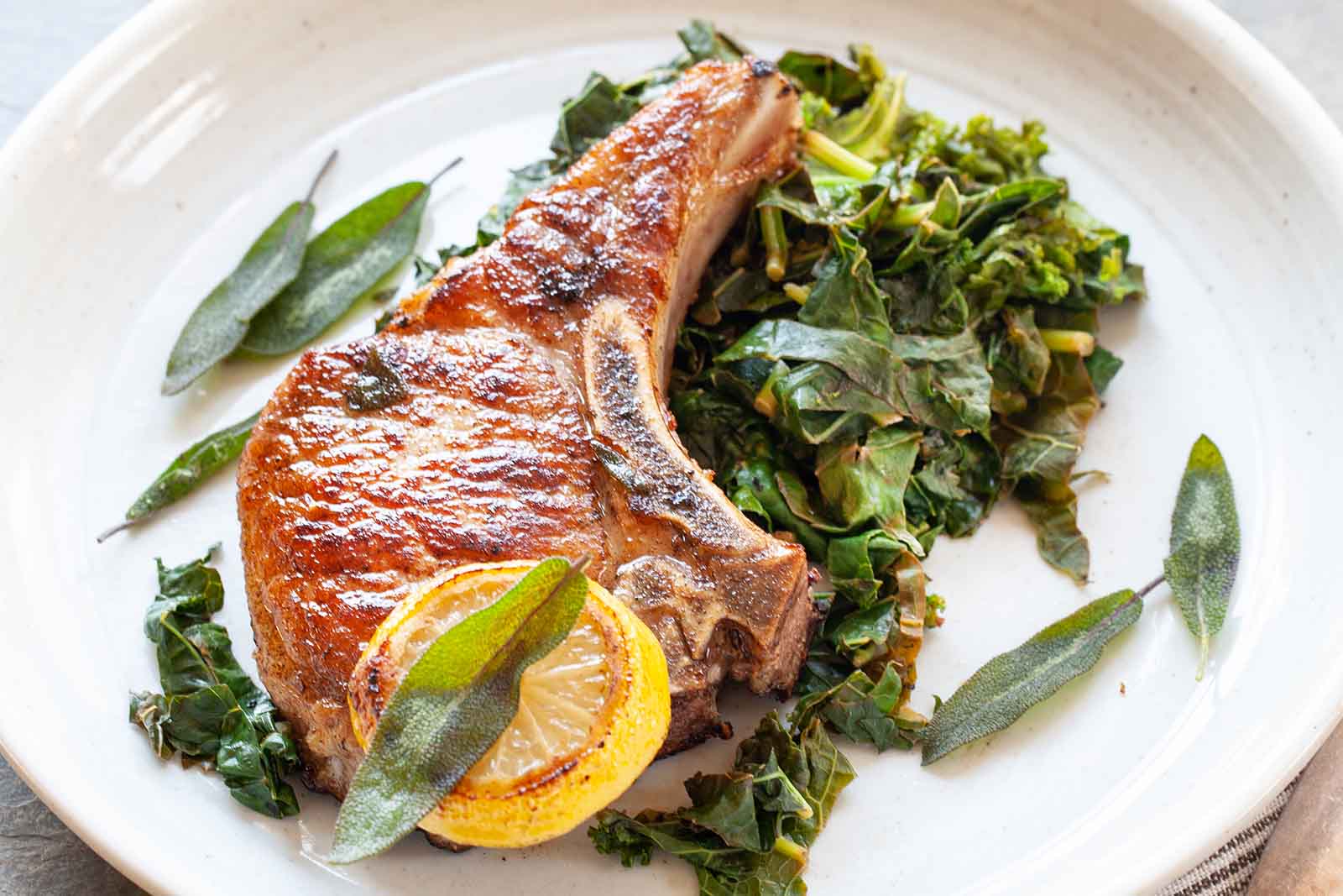 Pan-Seared Pork Chops with Garlic and Greens