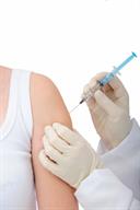 A person getting a shot in the upper arm.