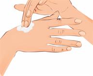 A person applying skin lotion moisturizer to the hands.
