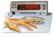 A sensor clipped onto a finger to test the amount of oxygen in the blood.