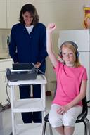 A young child being tested for hearing issues.