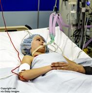 A child on a ventilator.