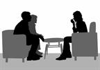 Two people talking with a counselor.