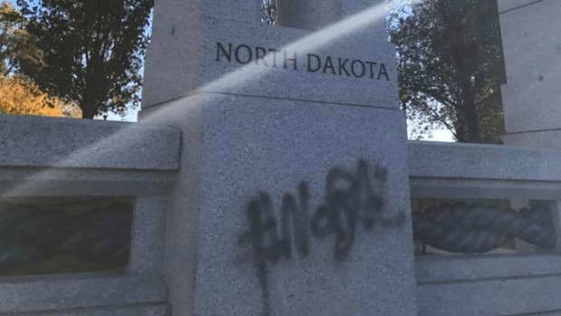 Graffiti on the North Dakota portion of the World War II Memorial in Washington D.C. Photo via Facebook
