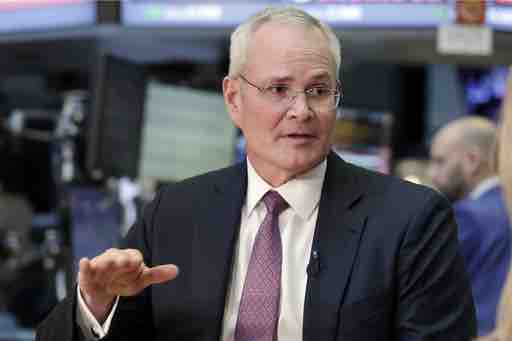Exxon Mobil Chairman & CEO Darren Woods is interviewed on the floor of the New York Stock Exchange, Wednesday, March 1, 2017. The new CEO of Exxon Mobil says the company will increase production and has a mix of projects that will let Exxon respond to any level of oil and gas prices. (AP Photo/Richard Drew)