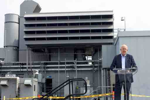 Ron Nichols president of Southern California Edison (SCE), talks during a news conference launching a unique systems combining a hybrid battery and gas turbine to produce and store electricity at the SCE Center Power Plant in Norwalk, Calif., on Monday, April 17, 2017. Nichols said the twin systems that went online March 30 operate somewhat like a hybrid car, drawing first on the battery, then switching over to the gas turbine if power demands spike. (AP Photo/Christopher Weber)