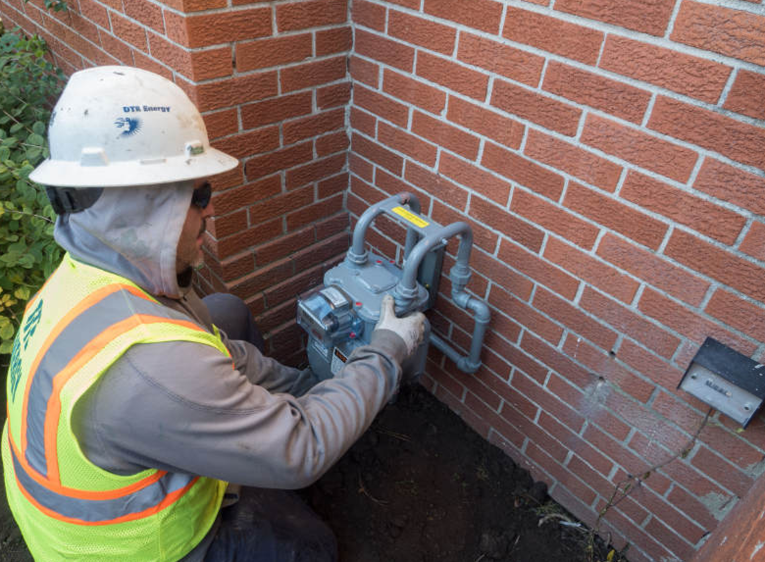 One of thousands of meter upgrades being installed outside homes.