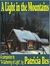 A Light in the Mountains by Patricia Iles