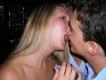 Is her tongue about to go up his nose?
