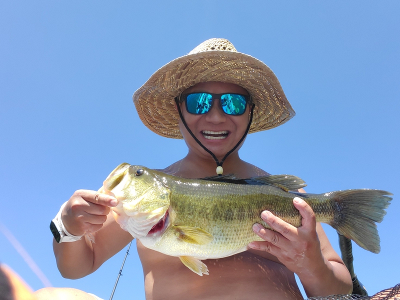 A photo of Asian Bucket  Man's catch