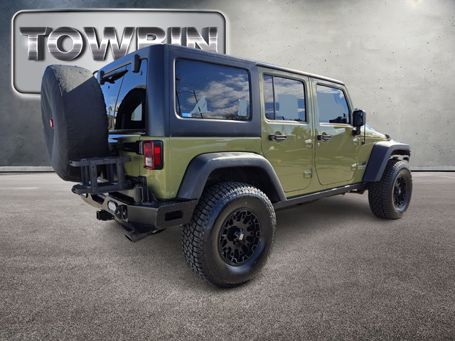 2013 Jeep Wrangler Unlimited Rubicon - Commando Green exterior view 4