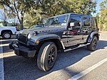 Used 2017 JEEP WRANGLER UNLIMITED SAHARA in ORANGE PARK, FLORIDA (Photo 1)