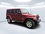 Used 2013 JEEP WRANGLER UNLIMITED SAHARA in JACKSONVILLE, FLORIDA (Photo 1)