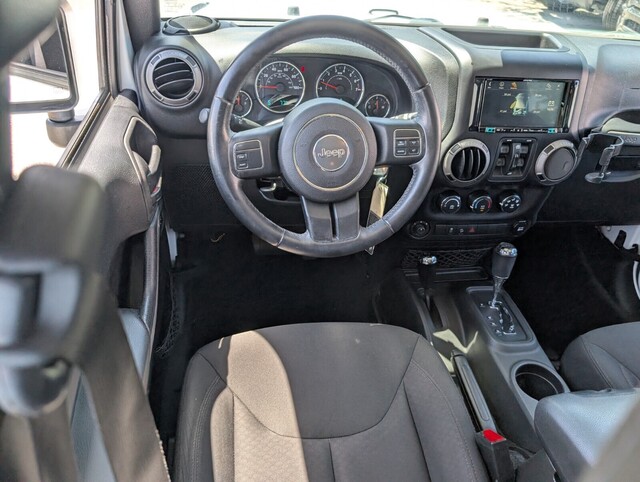 used 2015 Jeep Wrangler Unlimited car, priced at $18,988
