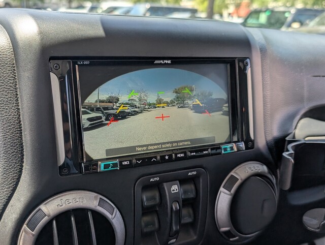 used 2015 Jeep Wrangler Unlimited car, priced at $18,988