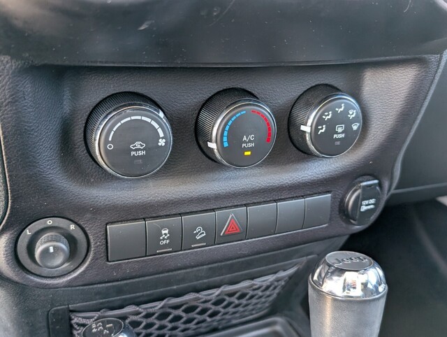 used 2015 Jeep Wrangler Unlimited car, priced at $18,988