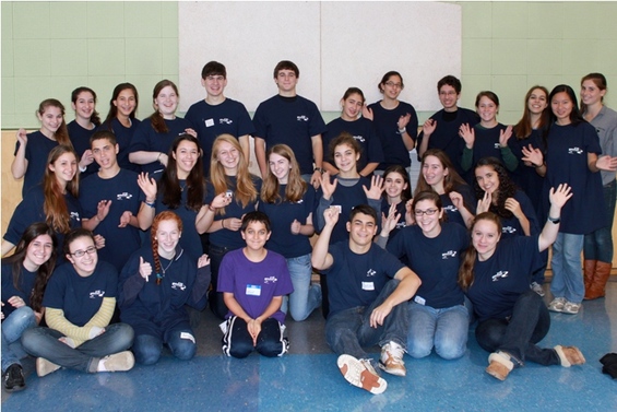 Ari shines with a group of teen volunteers at Gateways