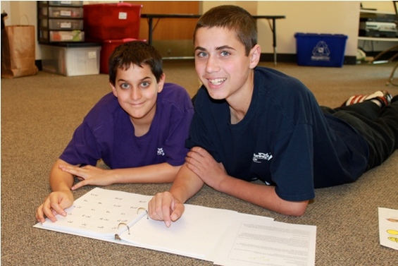 Ari and Mike reading Hebrew